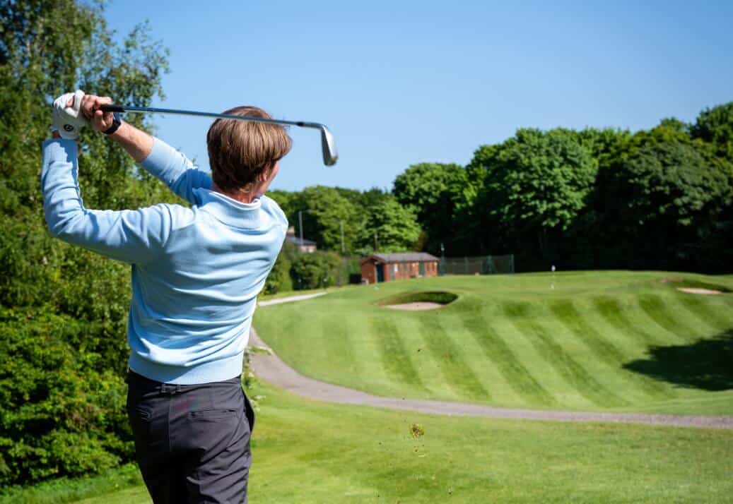 golfer at allerton manor golf club in liverpool