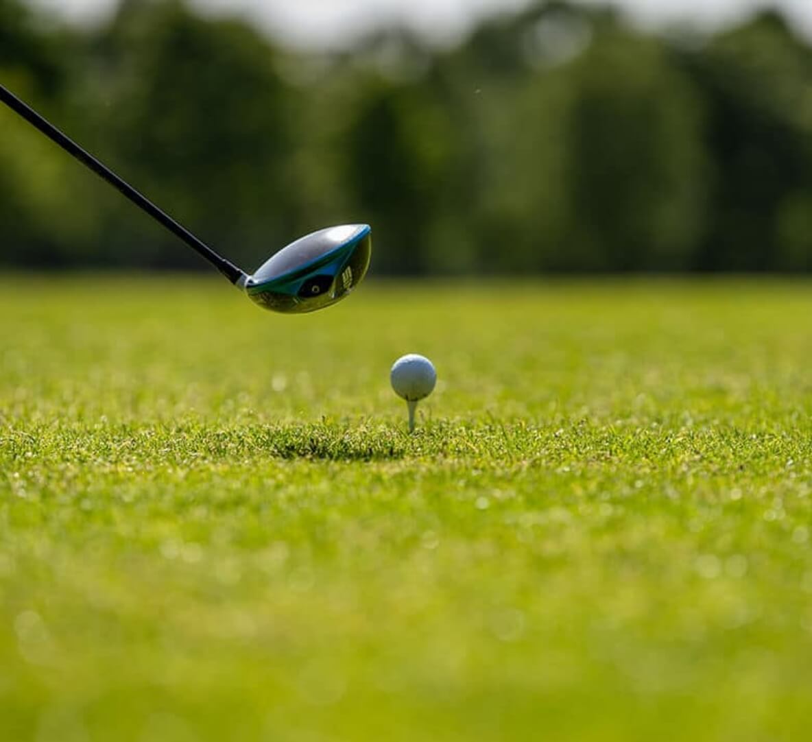 A golf club lining up a swing
