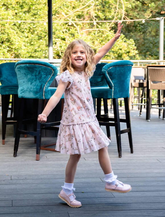 A young girl having fun at Allerton Manor