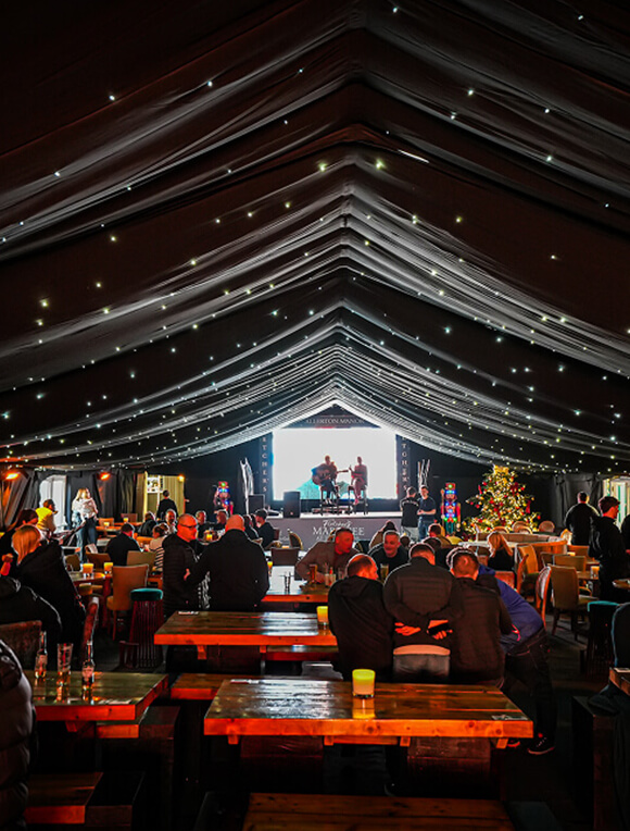 Inside fletcher's Marquee with a live band