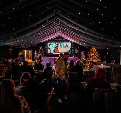 People under the Fletcher's Marquee tent